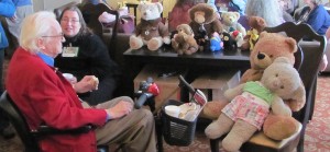 Fan Guest of Honor David Kyle, and Judy Bemis converse with the attendees of the Teddy Bear Tea